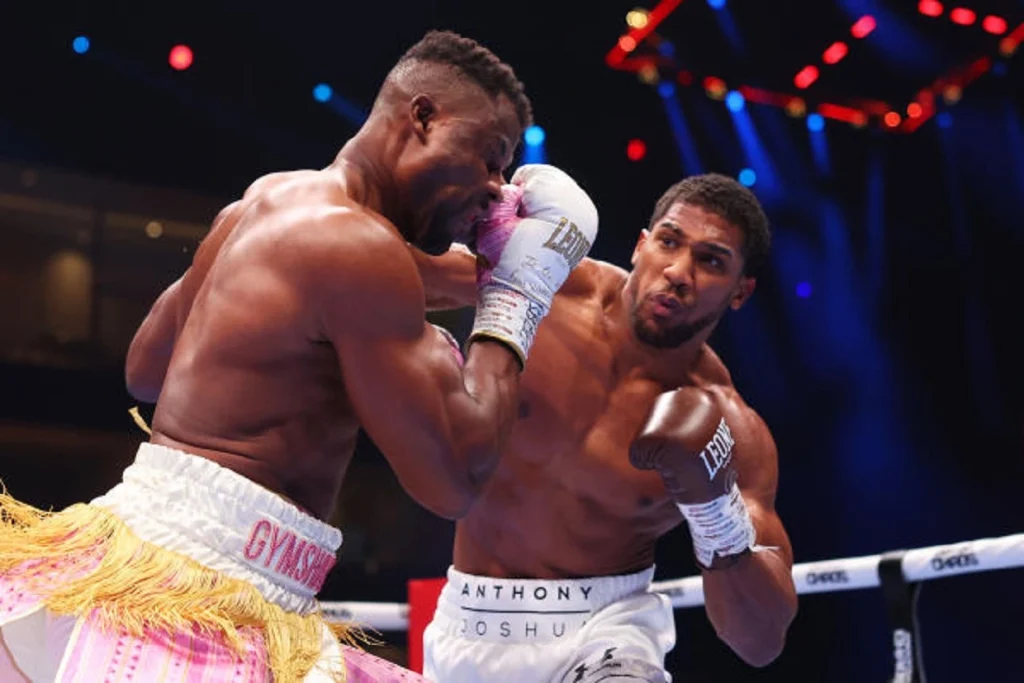 “Don’t quit boxing, you’re the next Tyson,” Joshua consoles Ngannou after KO defeat