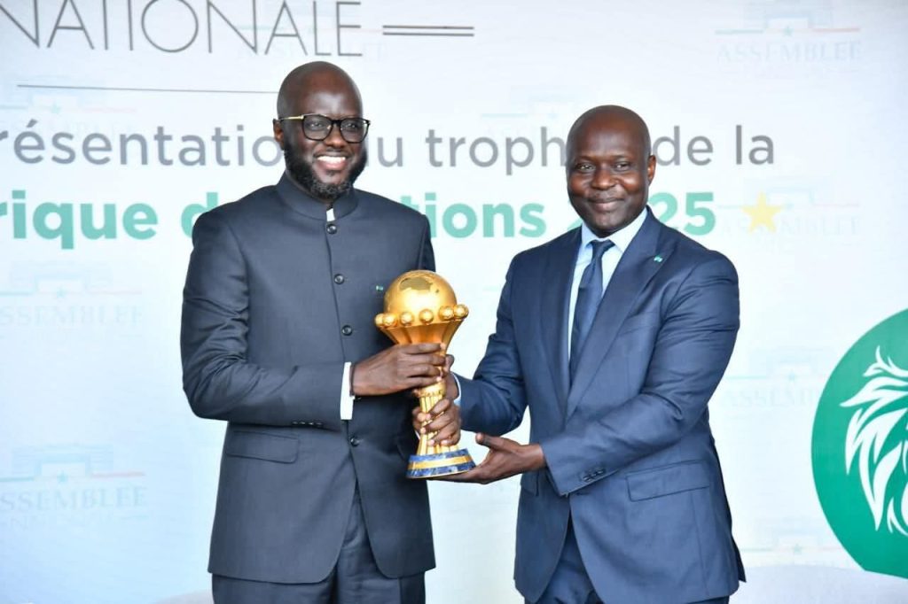 The CAN 2025 trophy presented to the President of the National Assembly